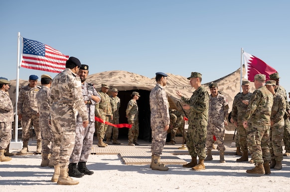 AL UDEID AIR BASE, Qatar (Nov. 3, 2025) Adm. Brad Cooper, commander of U.S. Central Command, right, speaks with Chief of Staff of Qatar Armed Forces Lt. Gen. Jassim Al-Mannai during a ceremony at Al Udeid Air Base, Nov. 3. The event marked the opening of a new Combined Command Post for air defense staffed by personnel from Qatar and U.S. forces. (U.S. Air Force photo by Tech. Sgt. Chris Thornbury)