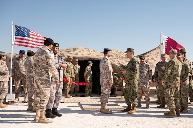 AL UDEID AIR BASE, Qatar (Nov. 3, 2025) Adm. Brad Cooper, commander of U.S. Central Command, right, speaks with Chief of Staff of Qatar Armed Forces Lt. Gen. Jassim Al-Mannai during a ceremony at Al Udeid Air Base, Nov. 3. The event marked the opening of a new Combined Command Post for air defense staffed by personnel from Qatar and U.S. forces. (U.S. Air Force photo by Tech. Sgt. Chris Thornbury)