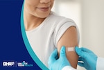 DHA logo and "Unlock Your Health" logo, doctor placing a band aid on a woman's upper arm.