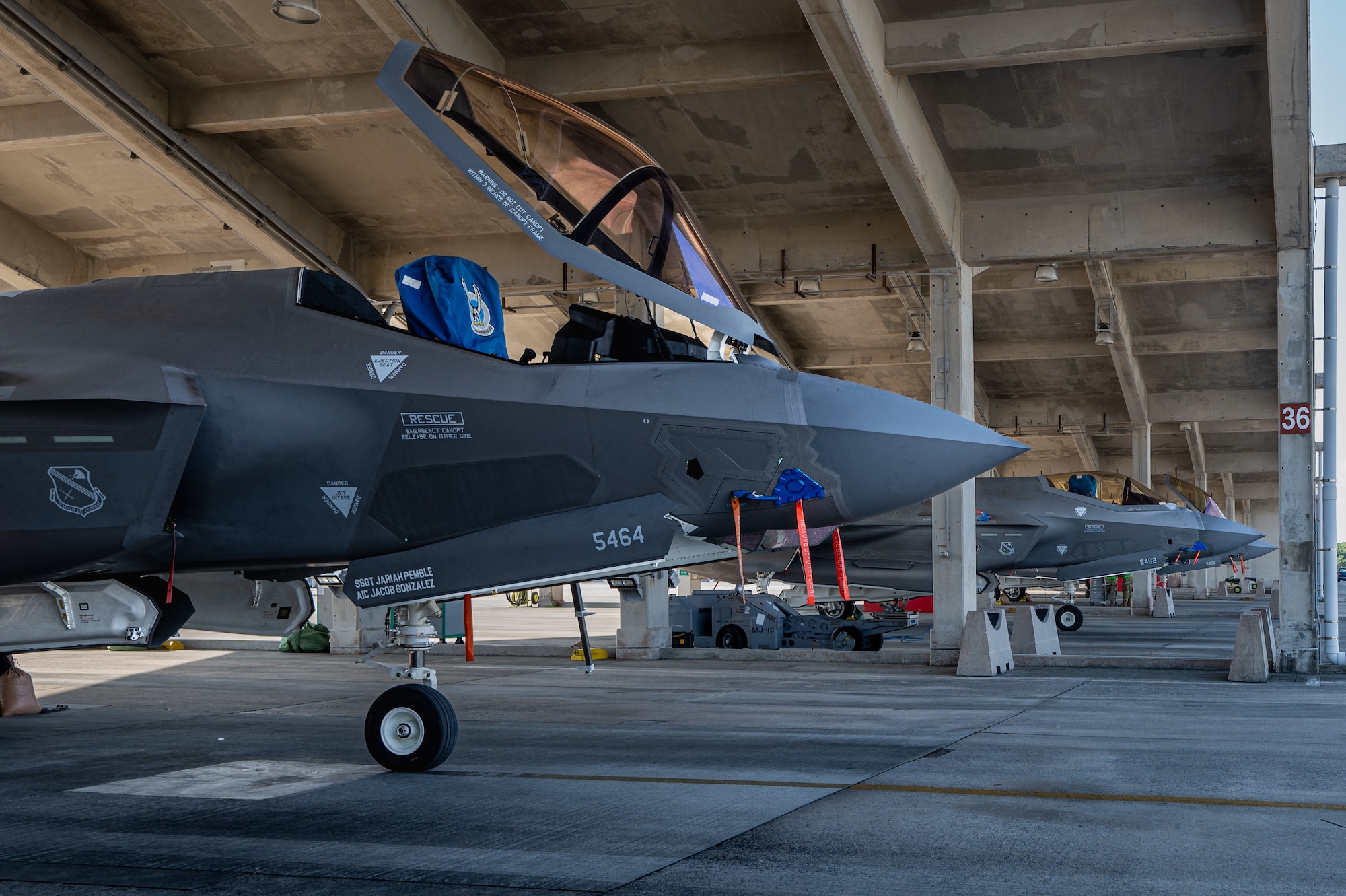 F-35A Lightning IIs sit on the flightline.