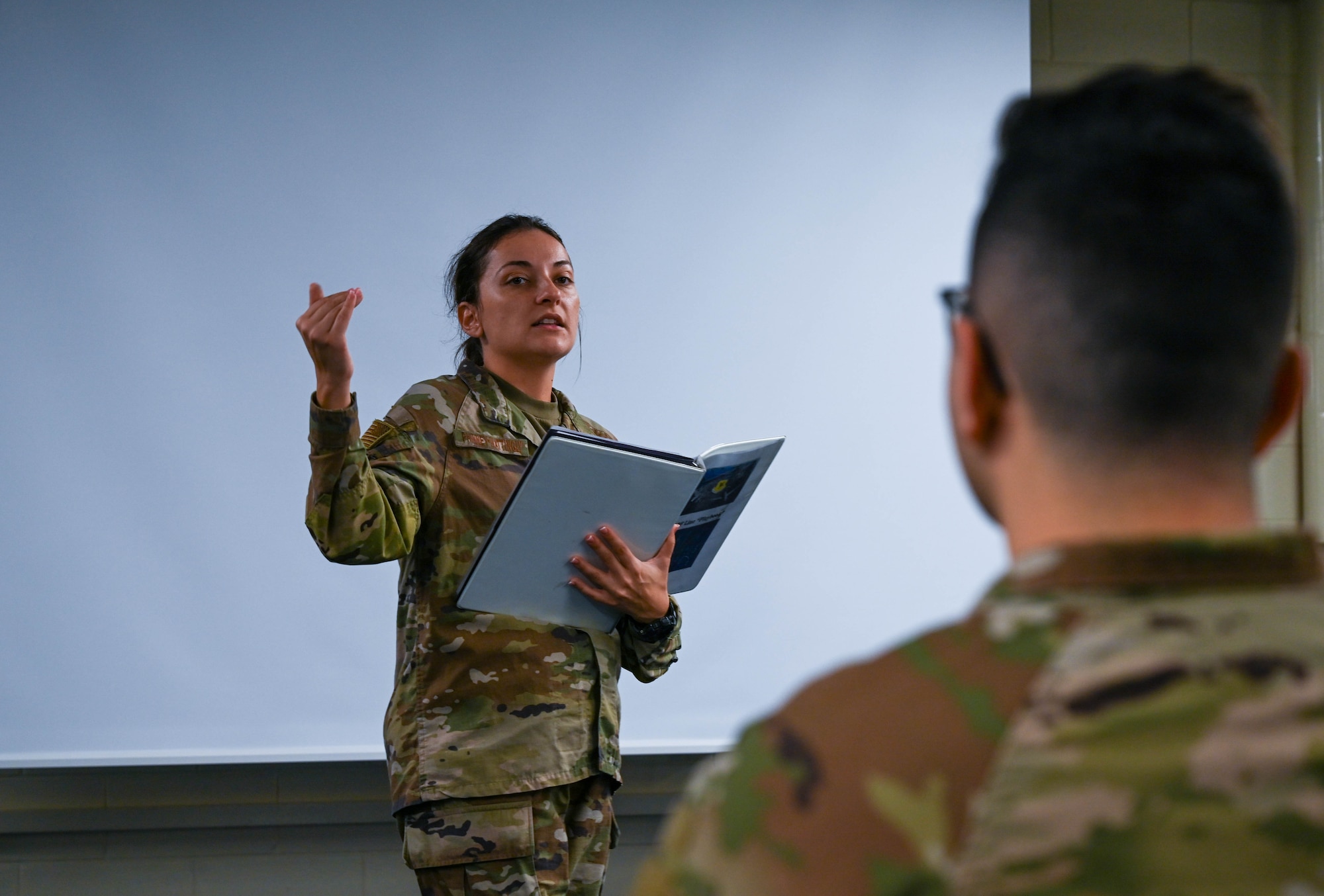Service member giving brief.