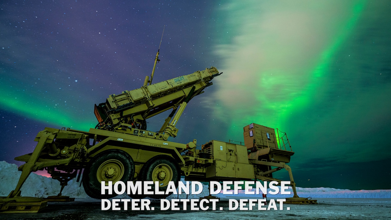 The northern lights glow behind a Patriot M903 launcher station assigned to 5th Battalion, 52nd Air Defense Artillery Regiment, during Exercise ARCTIC EDGE 2022 at Eielson Air Force Base, Alaska, Mar. 5, 2022. The Patriot system allows Soldiers to detect, analyze and defend against incoming air and missile threats. (U.S. Air Force photo by Senior Airman Joseph P. LeVeille)