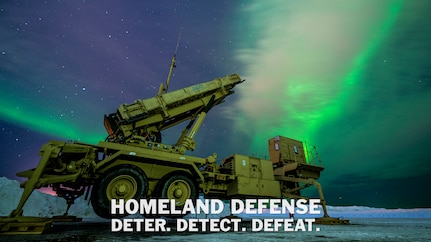 The northern lights glow behind a Patriot M903 launcher station assigned to 5th Battalion, 52nd Air Defense Artillery Regiment, during Exercise ARCTIC EDGE 2022 at Eielson Air Force Base, Alaska, Mar. 5, 2022. The Patriot system allows Soldiers to detect, analyze and defend against incoming air and missile threats. (U.S. Air Force photo by Senior Airman Joseph P. LeVeille)