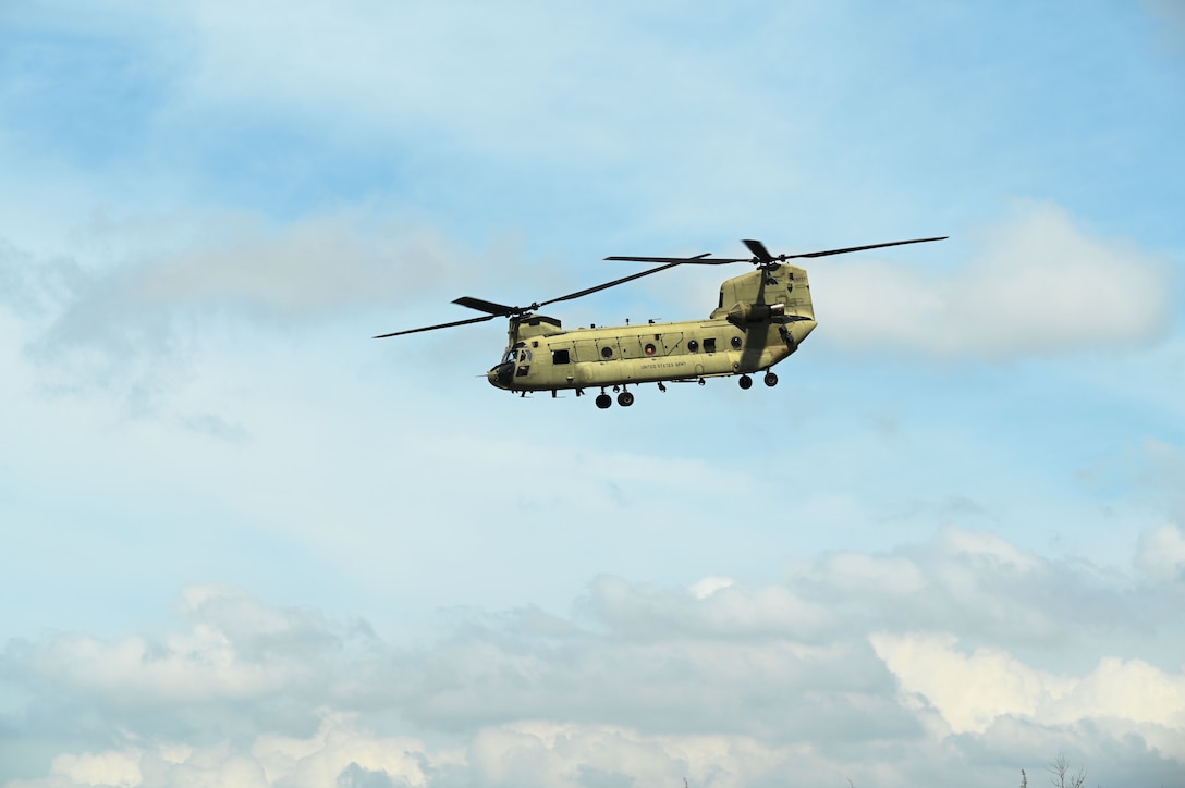 A helicopter flies in the sky