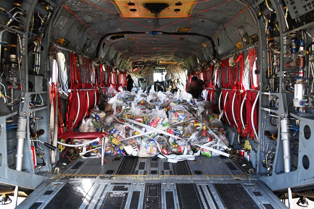 Bags are loaded on a helicopter