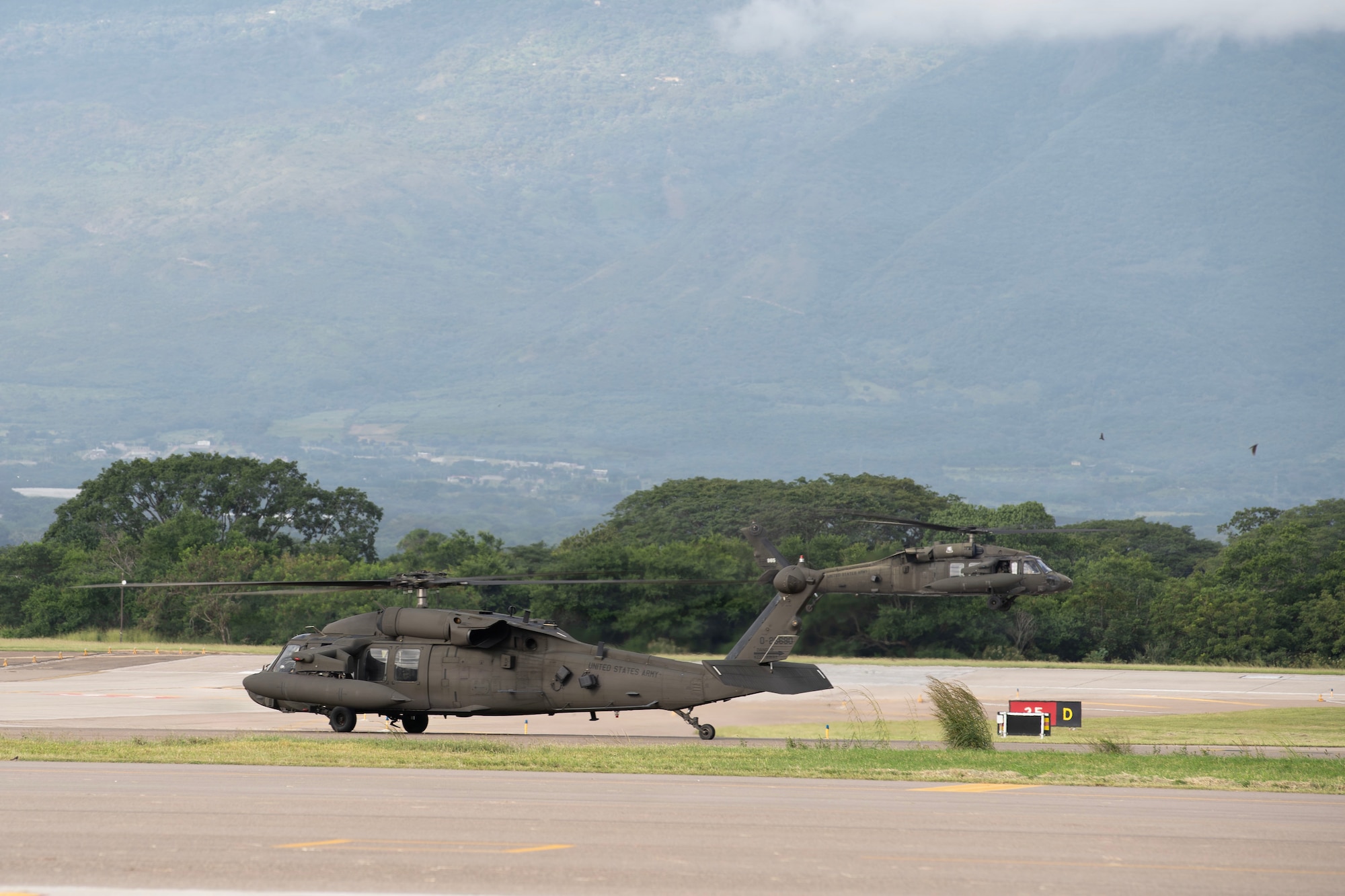 A helicopter on a flightline