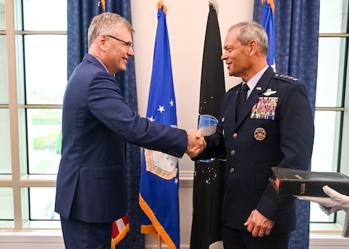 Secretary of the Air Force Troy Meink, left, welcomes Gen. Ken Wilsbach as the new Chief of Staff of the Air Force at the Pentagon, Arlington, Virginia, Nov. 3, 2025. Wilsbach became the 24th CSAF. (U.S. Air Force photo by Staff Sgt. Stuart Bright)