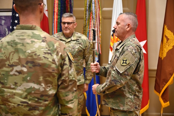 U.S. Army Chief Warrant Officer 5 (CW5) Robert Gibson, Sr., assumes responsibility as the seventh Command Chief Warrant Officer of the District of Columbia National Guard from CW5 Bernard Aguon during a change of responsibility ceremony at the D.C. Armory, Oct. 22, 2025. The ceremony was officiated by Brig. Gen. Craig M. Maceri, the D.C. Army National Guard’s Land Component Command (LCC) commander. The Command Chief Warrant Officer is the top Warrant Officer advisor to the D.C. National Guard’s Commanding General, the Adjutant General (TAG), and Land Component Command commander. The CCWO provides specialized expertise, leadership, and mentorship, and is responsible for the training, readiness, and professional development of the warrant officer corps.