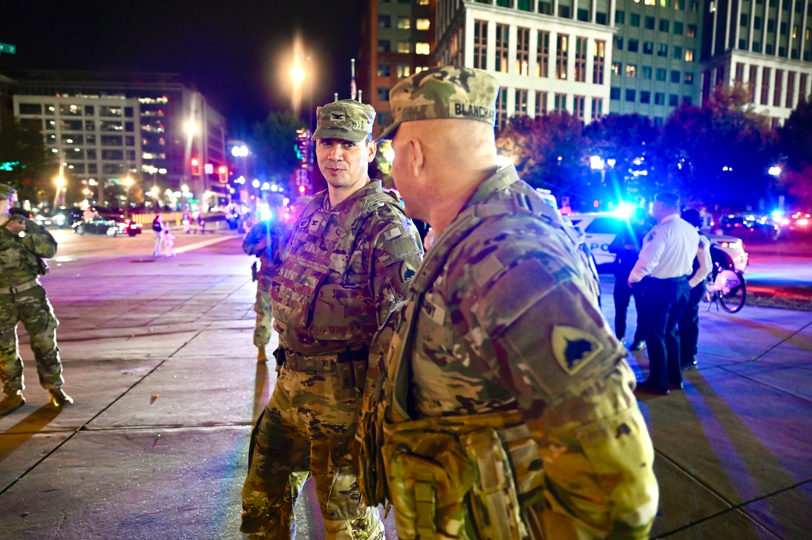 U.S. Army Col. Larry Doane, Joint Task Force - District of Columbia commander, speaks with U.S. Army Brig. Gen. Leland D. Blanchard II, Commanding General (Interim) of the District of Columbia National Guard, during a presence patrol in the Navy Yard neighborhood in Washington, D.C., Oct. 25, 2025. The D.C. Safe and Beautiful mission reinforces readiness and unity of effort among agencies dedicated to maintaining public safety in the nation’s capital.