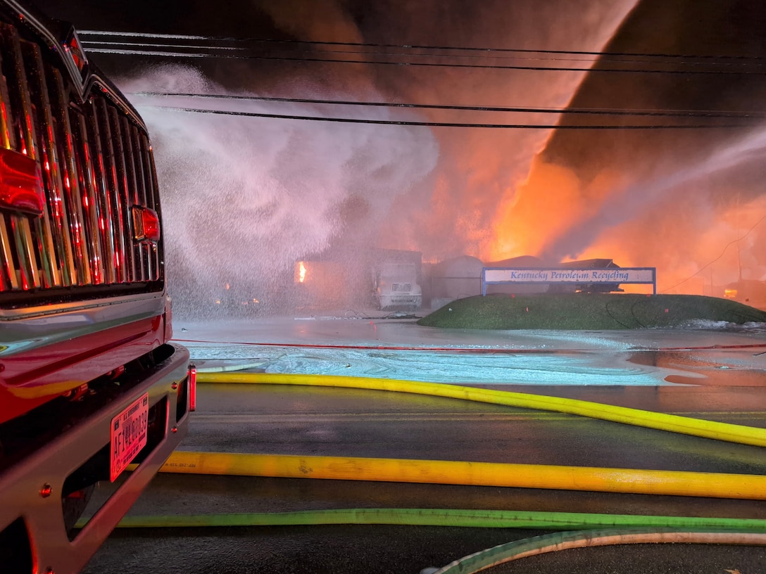Firefighters from the Kentucky Air National Guard’s 123rd Airlift Wing deploy firefighting foam at a petroleum recycling facility near the impact of a fatal civilian airplane crash in Louisville, Ky., Nov. 4, 2025.