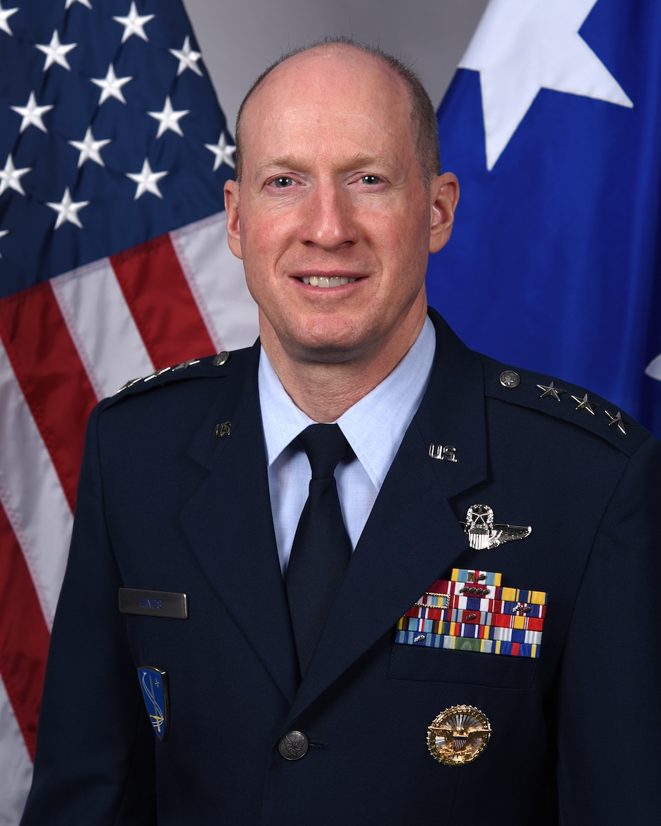 A military member poses for a portrait.