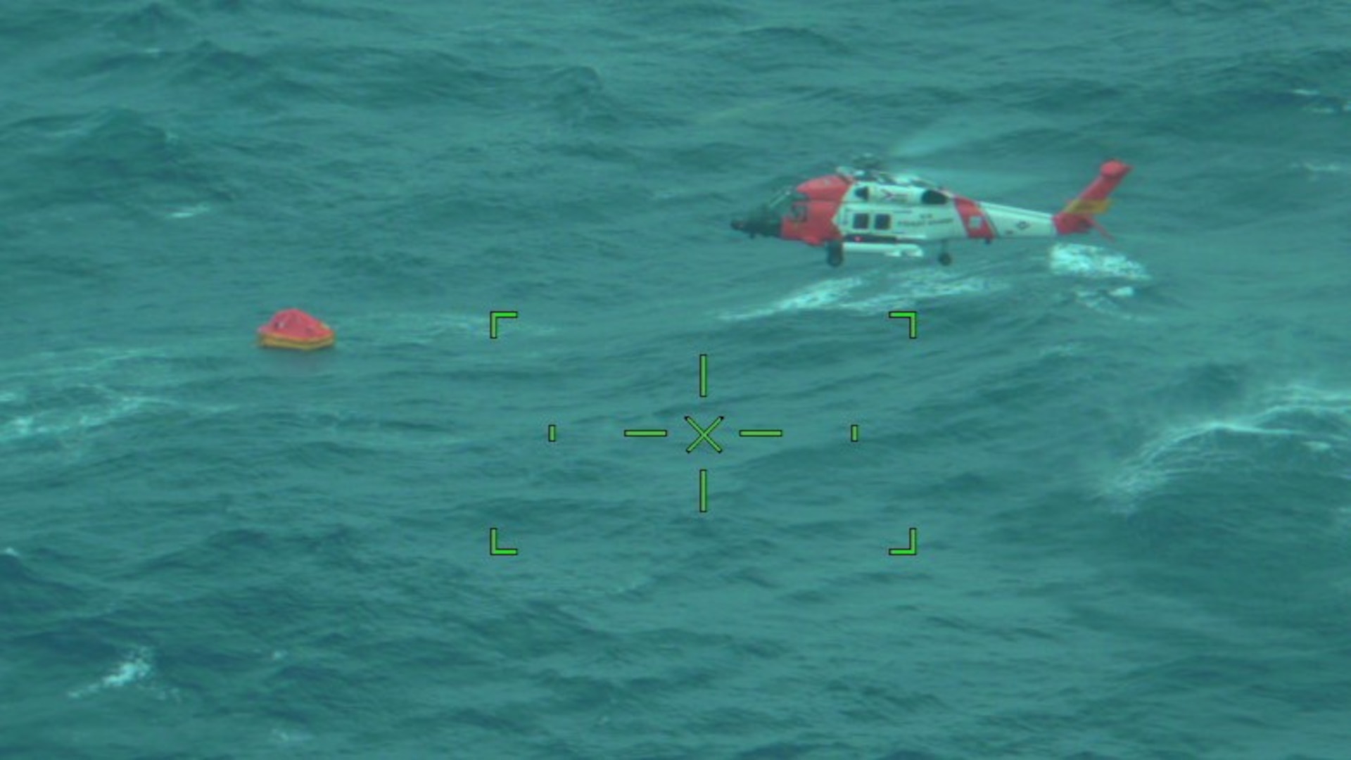 A U.S. Coast Guard MH-60 Jayhawk helicopter crew from Air Station Elizabeth City rescued five individuals from a life raft after their sailboat, Magic Bus, began taking on water 260 nautical miles offshore Cape Hatteras, N.C., Thursday, Oct. 26, 2023. The Coast Guard coordinated with the aircraft carrier USS George H.W. Bush for refueling support during the long-distance rescue. All five individuals were recovered in good health and transported safely to Air Station Elizabeth City. (U.S. Coast Guard photo by Air Station Elizabeth City)