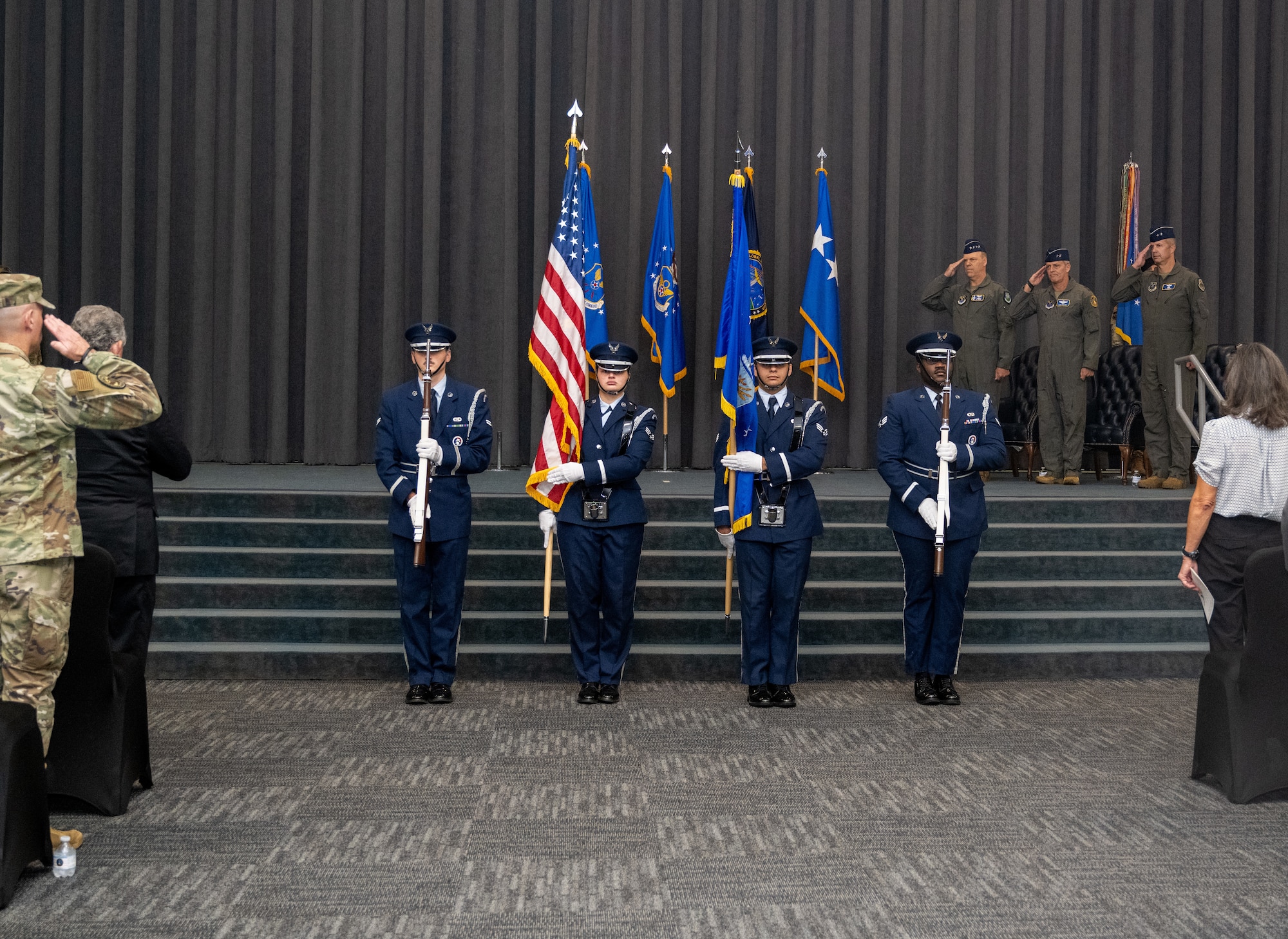 U.S. Air Force Airmen present the colors