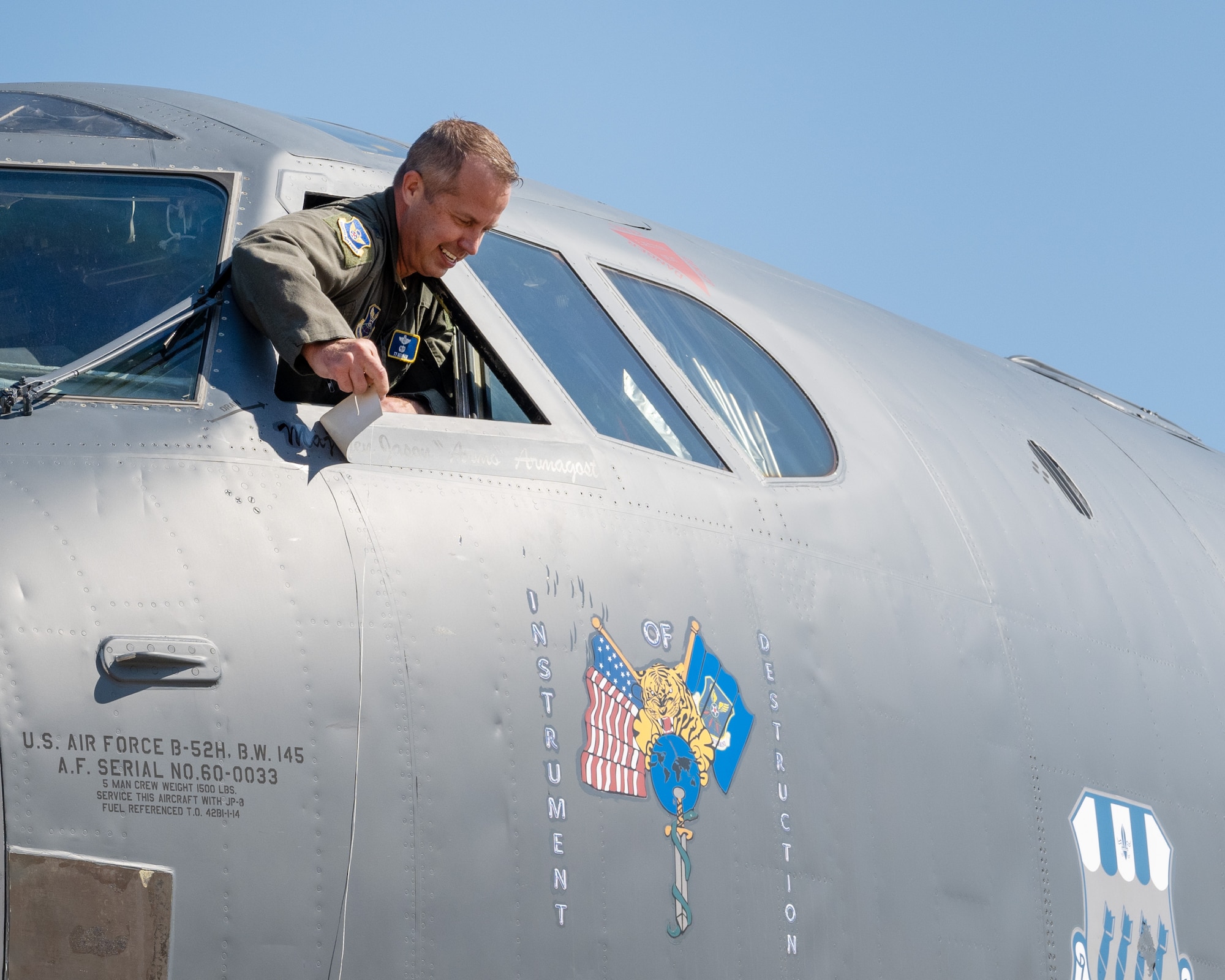 Maj. Gen. Ty Neuman unveils his name on a B-52 Stratofortress