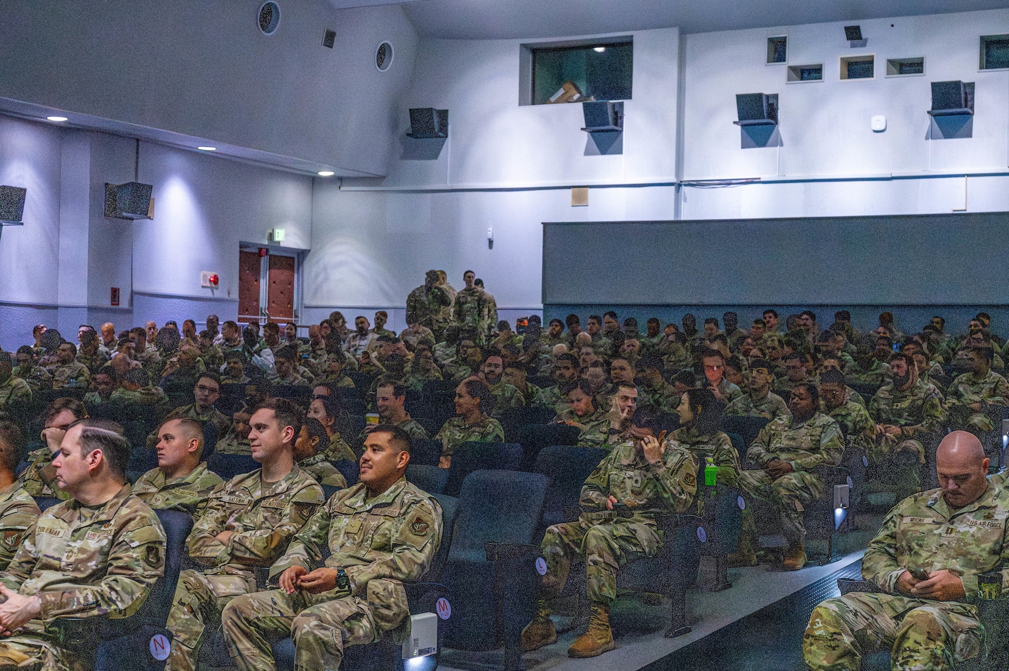 Personnel assigned to the 374th Airlift Wing gather for an all call.