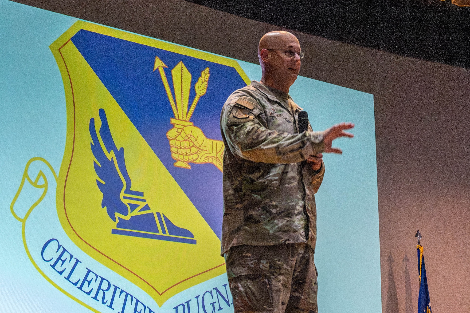 U.S. Air Force Col. Richard McElhaney, 374th Airlift Wing commander, gives remarks.