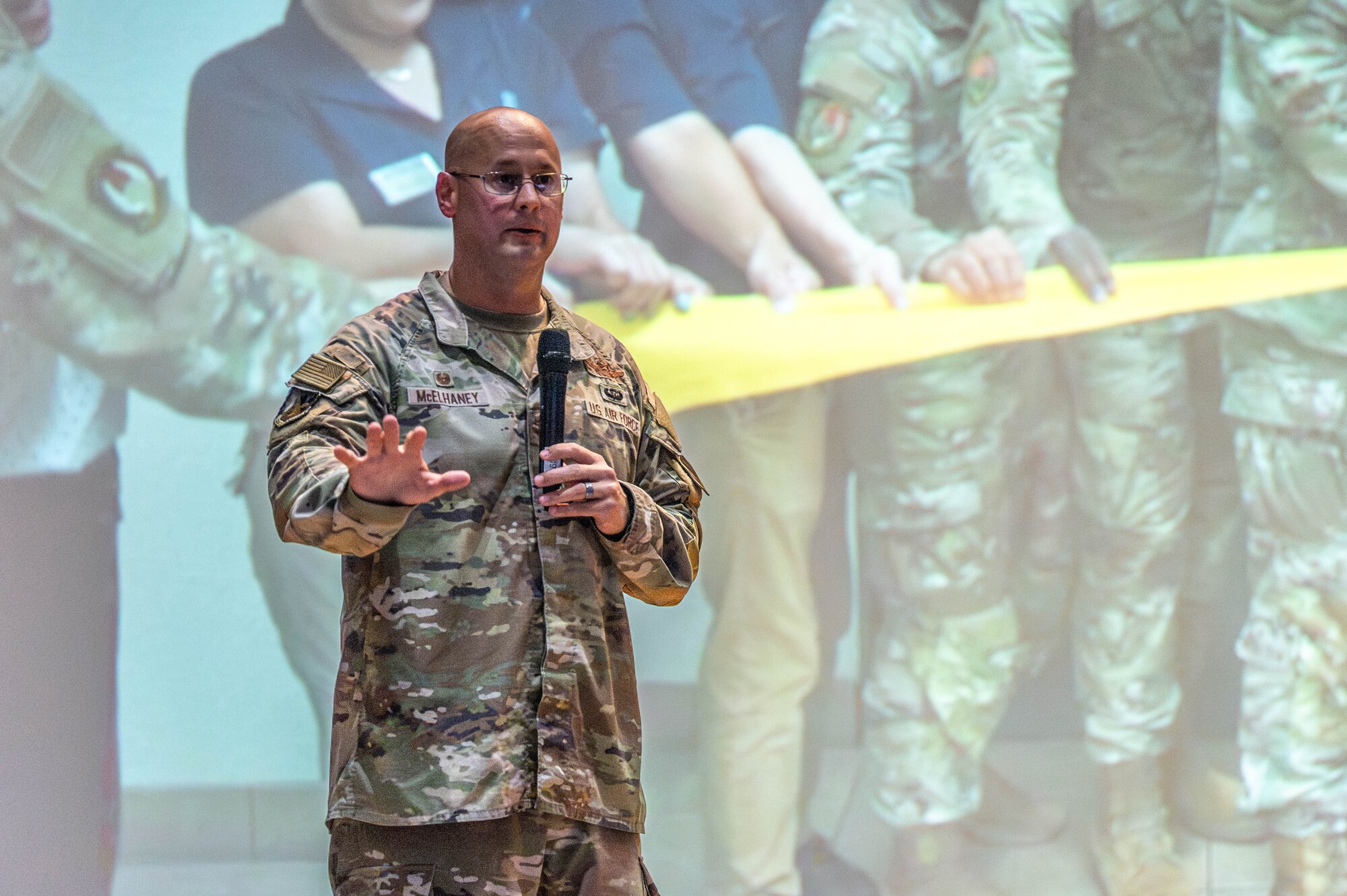 U.S. Air Force Col. Richard McElhaney, 374th Airlift Wing commander, gives remarks.