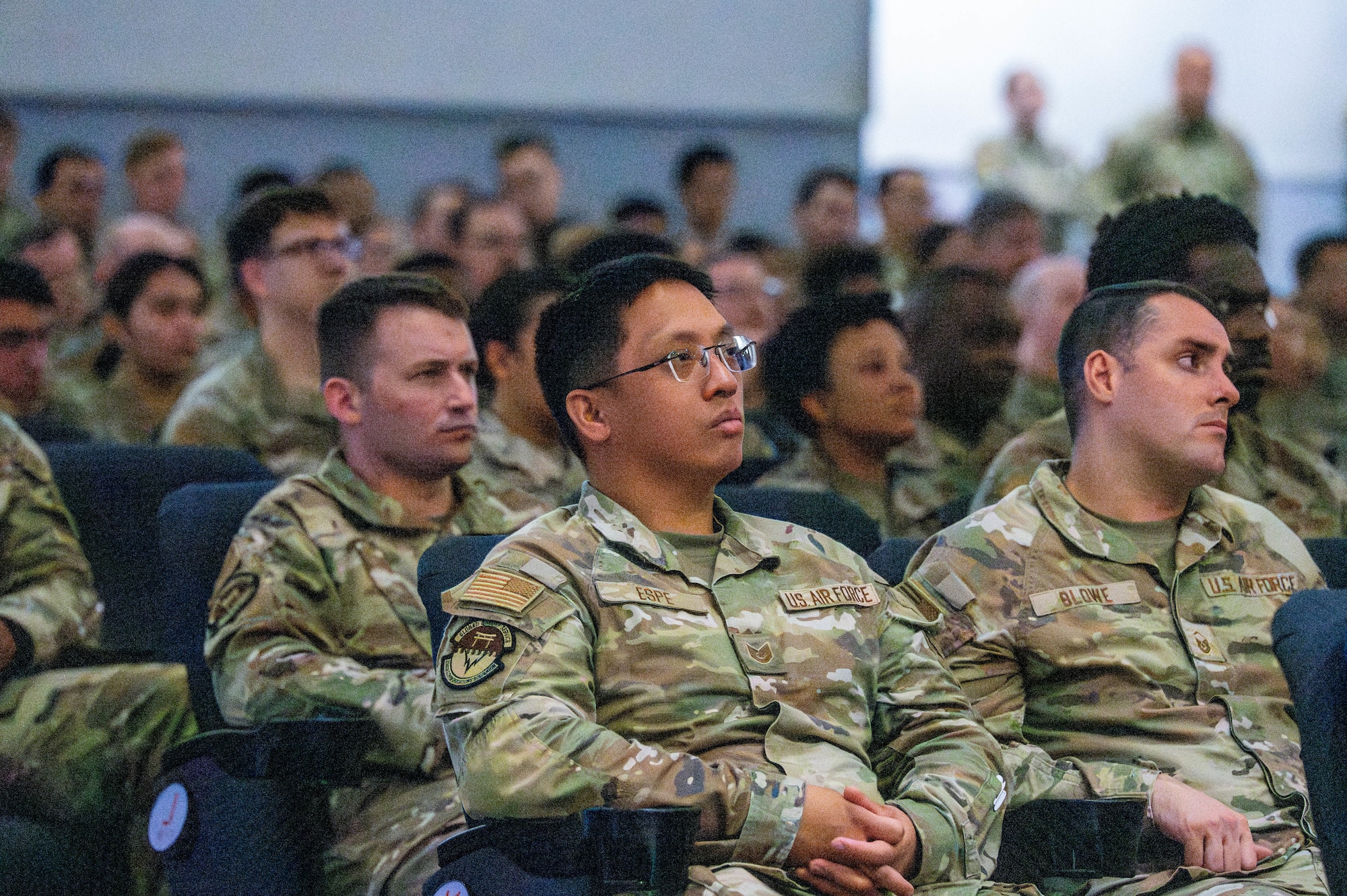 Members of the 374th Airlift Wing attend an all call.