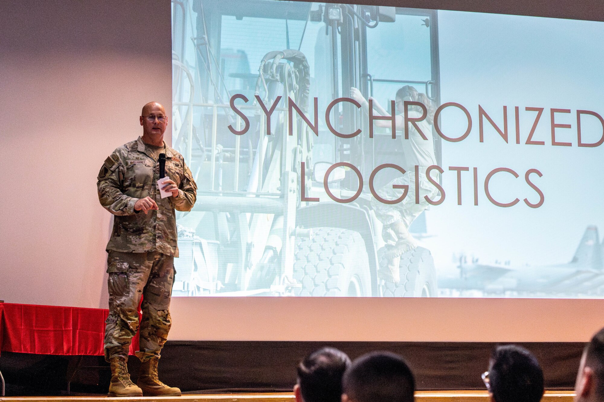 U.S. Air Force Col. Richard McElhaney, 374th Airlift Wing commander, gives remarks.