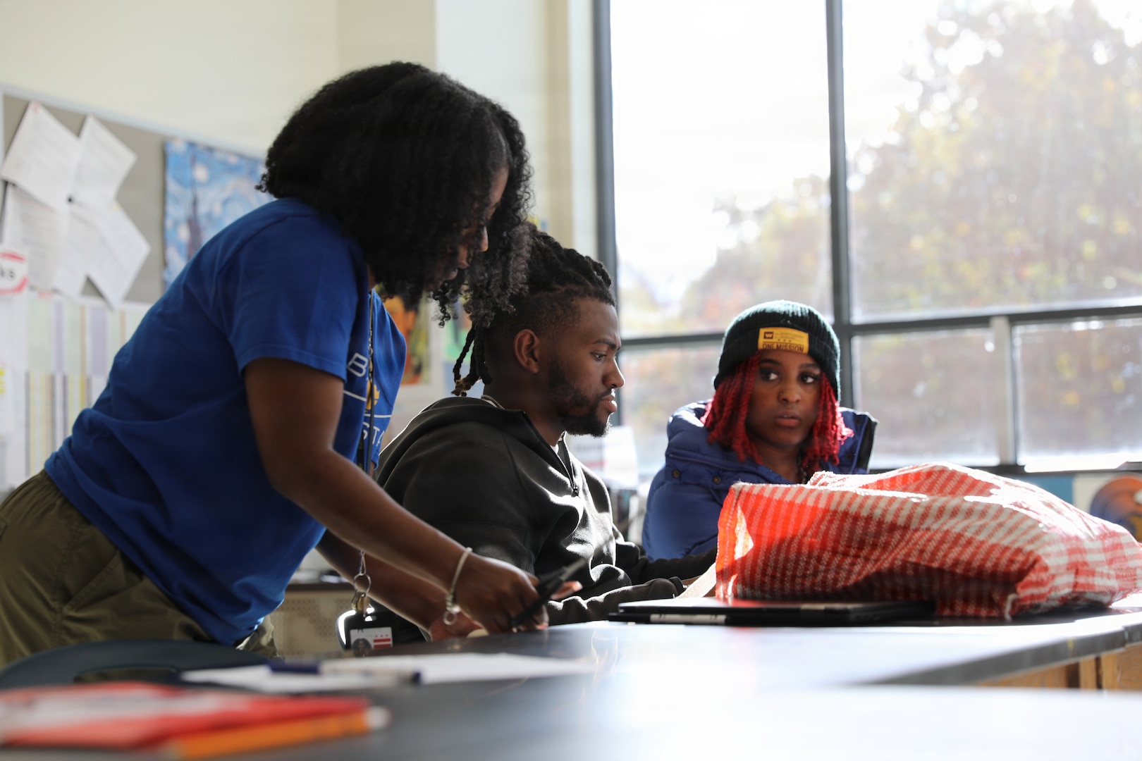 The D.C. National Guard Counterdrug Drug Demand Reduction Outreach team delivers a drug prevention presentation to students at Ballou STAY Opportunity Academy on Oct. 24, 2025, in recognition of Red Ribbon Week in Washington D.C. The session aimed to spark candid discussions about substance misuse and highlight the importance of making healthy, informed decisions. The DDRO outreach team emphasized its ongoing mission to combat drug abuse through education, awareness, and interactive programs designed to empower young people.
