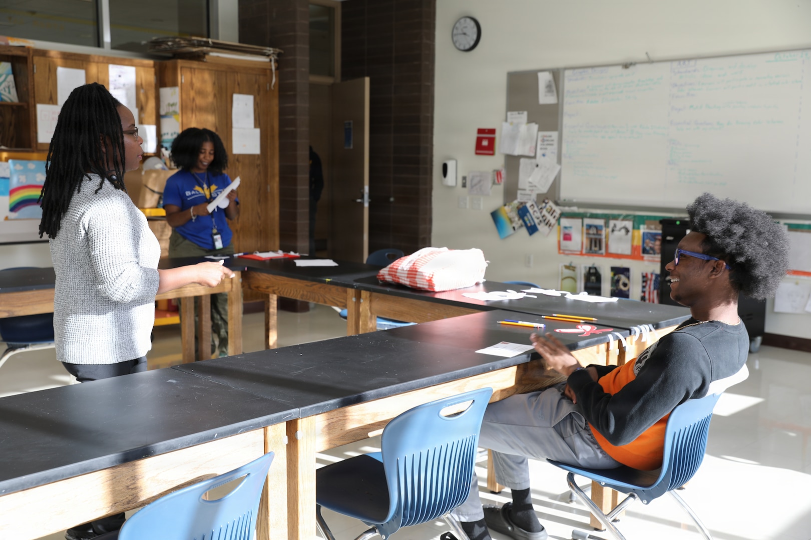 The D.C. National Guard Counterdrug Drug Demand Reduction Outreach team delivers a drug prevention presentation to students at Ballou STAY Opportunity Academy on Oct. 24, 2025, in recognition of Red Ribbon Week in Washington D.C. The session aimed to spark candid discussions about substance misuse and highlight the importance of making healthy, informed decisions. The DDRO outreach team emphasized its ongoing mission to combat drug abuse through education, awareness, and interactive programs designed to empower young people.