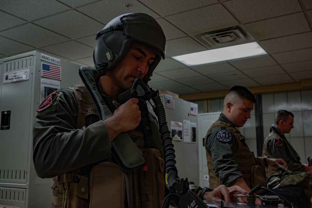 Three men training for a flight