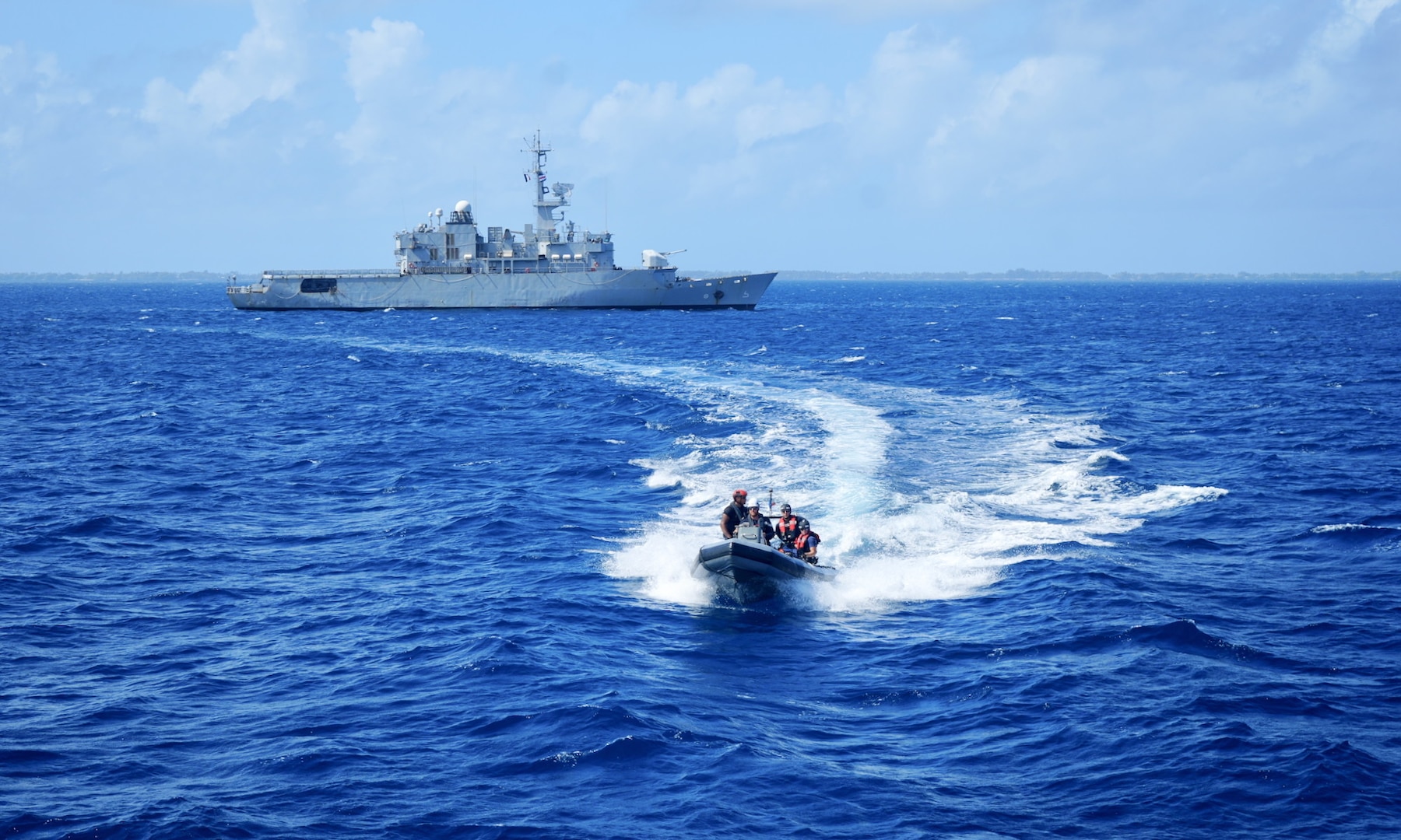 USCGC Frederick Hatch (WPC 1143) and FS Prairial (F731) crews work together off Majuro