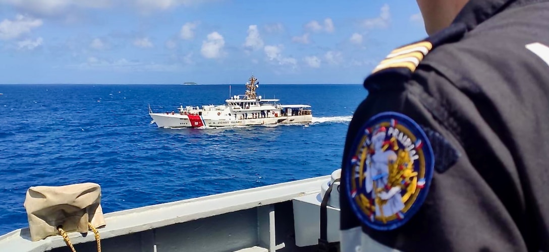 USCGC Frederick Hatch (WPC 1143) and FS Prairial (F731) crews work together off Majuro