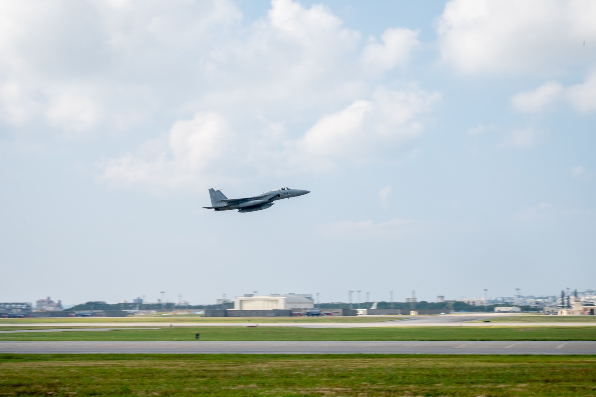 A jet takes off over Kadena Air Base.