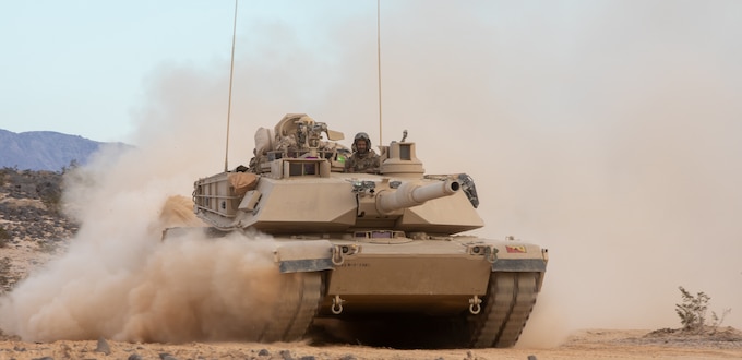 Soldiers of the Royal Saudi Land Forces (RSLF), equipped with M1 Abrams main battle tanks and M2 Bradley Fighting Vehicles, conduct force-on-force operations for the first time at the National Training Center during Rotation 26-02 at Fort Irwin, Calif., Nov. 4, 2025. Partnering with U.S. Army Central, the RSLF, and 3rd Security Forces Assistance Brigade, will integrate with 2nd Brigade, 1st Cavalry Division to improve interoperability and operational effectiveness in a tough, realistic environment. (U.S. Army photo by Staff Sgt. Devon Jones)