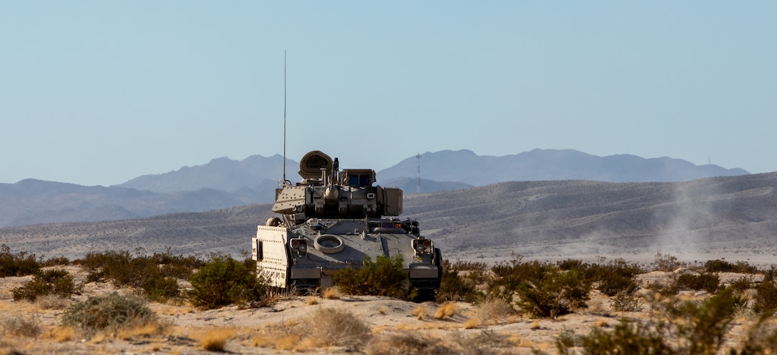 Soldiers of the Royal Saudi Land Forces (RSLF), equipped with M1 Abrams main battle tanks and M2 Bradley Fighting Vehicles, conduct force-on-force operations for the first time at the National Training Center during Rotation 26-02 at Fort Irwin, Calif., Nov. 4, 2025. Partnering with U.S. Army Central, the RSLF, and 3rd Security Forces Assistance Brigade, will integrate with 2nd Brigade, 1st Cavalry Division to improve interoperability and operational effectiveness in a tough, realistic environment. (U.S. Army photo by Staff Sgt. Devon Jones)