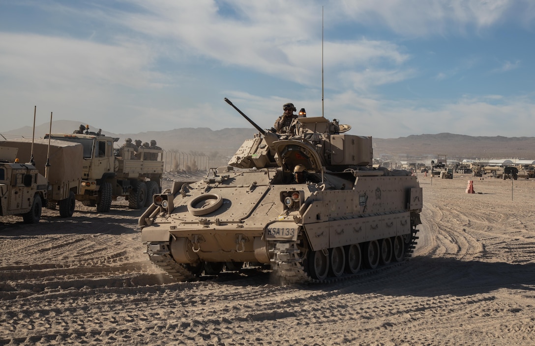 Soldiers of the Royal Saudi Land Forces (RSLF) move into ‘the Box’ during National Training Center Rotation 26-02 at Fort Irwin, Calif., Oct. 31, 2025. Partnering with U.S. Army Central, the RSLF, and 3rd Security Forces Assistance Brigade, will integrate with 2nd Brigade, 1st Cavalry Division to improve interoperability and operational effectiveness in a tough, realistic environment. This is the first time a RSLF unit has participated in a U.S. Army combat training center rotation. (U.S. Army photos by Staff Sgt. Carlie Stonebraker)