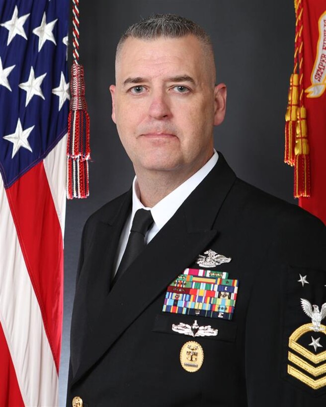 After completion of Basic Training, he attended Hospital Corpsman “A” School, Field Medical Service School, and subsequent Surgical Technologist “C” School. He was Selected for the Command Master Chief program in 2020. His operational assignments include 10th Marine Regiment; 6th Marine Regiment; Battalion Landing Team 2/6; 2d Medical Battalion; Surgical Shock Trauma Platoon Charlie; Fleet Hospital Three (FH-3); USS KEARSARGE (LHD-3) and as Command Master Chief of USS CARNEY (DDG-64).
Ashore, he served at Navy Personnel Command, Arlington, Va; Naval Air Station Keflavik, Iceland; Naval Hospital Beaufort; Naval Hospital Pensacola; as a High-Risk Instructor for the CENSECFOR, Riverine detachment and most recently as Command Master Chief of Naval Medical Center Camp Lejeune. He has completed multiple deployments to various locations in EUCOM, CENTCOM, and SOUTHCOM to include Operations Iraqi Freedom; Enduring Freedom; Inherent Resolve, and disaster relief efforts for Hurricane Ivan and Joint Task Force Katrina. CMDCM Roeder is a graduate of the Navy Senior Enlisted Academy (Class 207, Gray), the Command Master Chief & Chief of the Boat course, and the Major Command CMC course. He holds a Bachelor of Science degree in Health Care Administration with a focus in Biostatistics. Additionally, he has been awarded the Meritorious Service Medal (two awards), Navy and Marine Corps Commendation Medal (four awards), Navy and Marine Corps Achievement Medal (three awards), and various unit and campaign awards. He is qualified as an Enlisted Fleet Marine Force Warfare Specialist, Enlisted Surface Warfare Specialist, Enlisted Aviation Warfare Specialist and Master Training Specialist. Master Chief Roeder is currently serving as the Command Master Chief of II Marine Expeditionary Force, headquartered at Camp Lejeune, NC.
