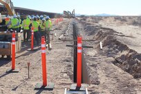 Outdated fencing is removed and replaced with new bollard-style barrier panels installed by U.S. Army Corps of Engineers South Pacific Border Task Force contractors near Yuma, Arizona, Oct 15. The BMGR-1 border barrier project spans approximately 15 miles, replacing older fencing with steel bollard barriers. USACE is replacing permanent border barriers along the southern border of the U.S. at the direction of the U.S. Army by the Secretary of War, in response to the presidential national emergency declaration dated Jan. 20, 2025, authorizing the use of Section 2803 of Title 10, U.S. Code. (Photo by Robert DeDeaux USACE PAO)
