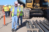 U.S. Army Corps of Engineers’ Robert Crist, a contracting officer representative assigned to the South Pacific Border Task Force, reinspects steel panels at the BMGR-1 project site near Yuma, Arizona, Oct. 15. USACE is replacing permanent border barriers along the southern border of the U.S. at the direction of the U.S. Army by the Secretary of War, in response to the presidential national emergency declaration dated Jan. 20, 2025, authorizing the use of Section 2803 of Title 10, U.S. Code. (Photo by Robert DeDeaux USACE PAO)