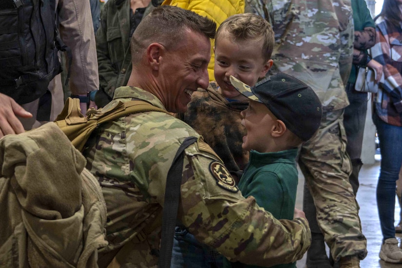 Members of the 171st Air Refueling Wing are welcomed home from deployment by family and friends Oct. 26, 2025, in Coraopolis, Pennsylvania. More than 120 Airmen returned after a 150-day deployment to the Middle East in support of Operation Spartan Shield. (U.S. Air National Guard photo by Tech. Sgt. Zoe M. Wockenfuss)