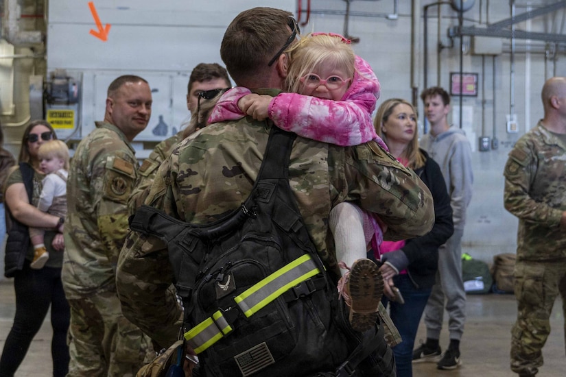 Members of the 171st Air Refueling Wing are welcomed home from deployment by family and friends Oct. 26, 2025, in Coraopolis, Pennsylvania. More than 120 Airmen returned after a 150-day deployment to the Middle East in support of Operation Spartan Shield. (U.S. Air National Guard photo by Tech. Sgt. Zoe M. Wockenfuss)
