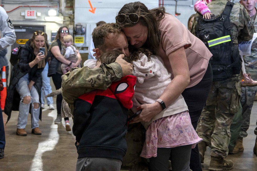 Members of the 171st Air Refueling Wing are welcomed home from deployment by family and friends Oct. 26, 2025, in Coraopolis, Pennsylvania. More than 120 Airmen returned after a 150-day deployment to the Middle East in support of Operation Spartan Shield. (U.S. Air National Guard photo by Tech. Sgt. Zoe M. Wockenfuss)