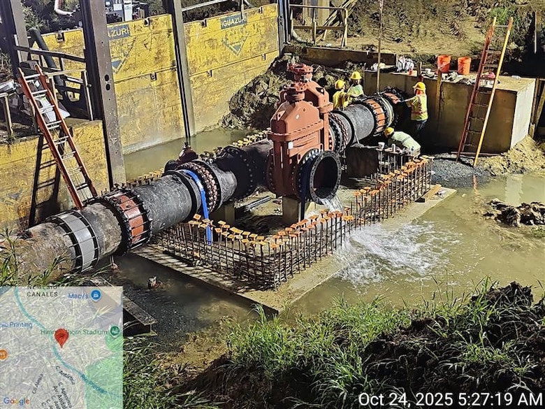Workers relocate a critical water line in San Juan during the Roosevelt Avenue Bridge replacement