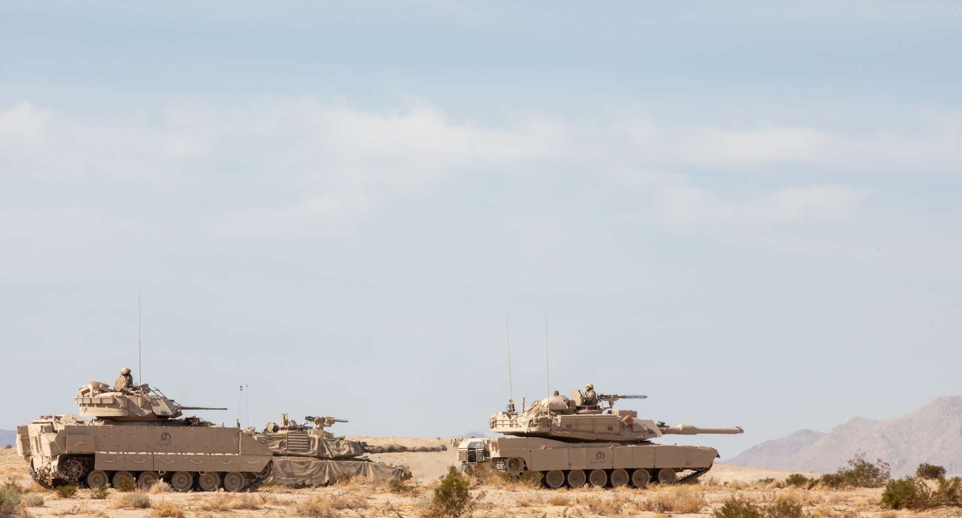 Soldiers of the Royal Saudi Land Forces (RSLF) conduct operations during National Training Center Rotation 26-02 at Fort Irwin, Calif., Nov. 7, 2025. Partnering with U.S. Army Central (USARCENT) and 3rd Security Forces Assistance Brigade, the RSLF will integrate with 2nd Brigade, 1st Cavalry Division, to enhance interoperability and operational effectiveness in a tough, realistic environment. Historically, USARCENT has served alongside the RSLF armored units since Operation Desert Storm in 1991. This is the first time a RSLF unit has participated in a U.S. Army combat training center rotation. (U.S. Army photo by Staff Sgt. Devon Jones)
