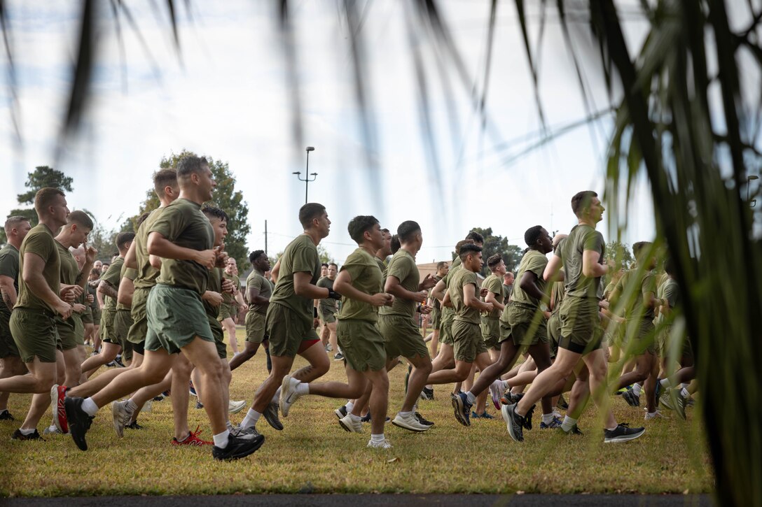 U.S. Marines and sailors with Marine Forces Reserve and Marine Forces South complete an annual birthday motivational run celebrating the 250th birthday of the U.S. Marine Corps, in New Orleans, Nov. 7, 2025. The run started at the Marine Corps Support Facility New Orleans and traveled along the Mississippi River ending back at MCSF. The run celebrates the history of the Marine Corps and creates esprit de corps and comradery among Marines. (U.S. Marine Corps photo by Lance Cpl. Priscilla Flores)