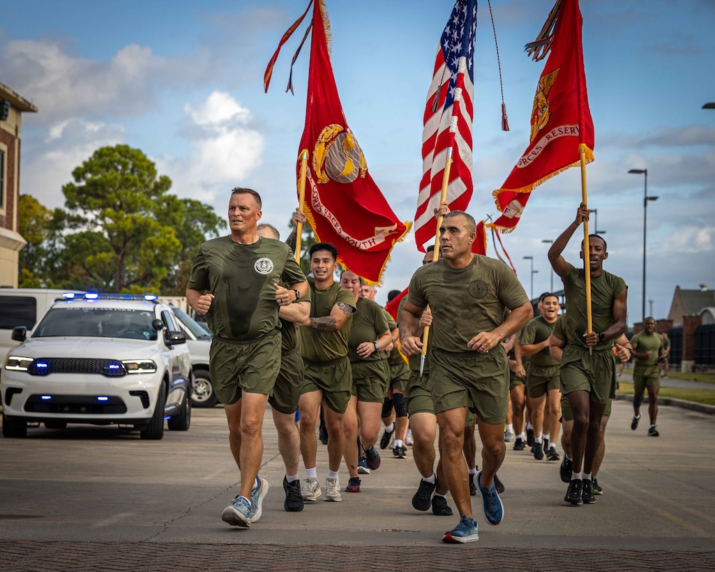 U.S. Marines and sailors with Marine Forces Reserve and Marine Forces South participate in an annual birthday motivational run celebrating the 250th birthday of the U.S. Marine Corps, in New Orleans, Nov. 7, 2025. The run started at the Marine Corps Support Facility New Orleans and traveled along the Mississippi River ending back at MCSF. The run celebrates the history of the Marine Corps and creates esprit de corps and comradery among Marines. (U.S. Marine Corps photo by Lance Cpl. Juan Diaz)