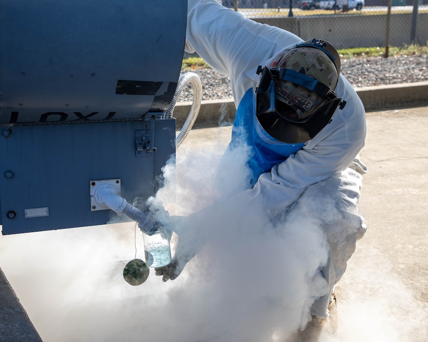 Airman in bio suit, cryo fog coming around.