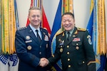 Chairman of the Joint Chiefs of Staff Gen. Dan Caine meets with the Chief of the General Staff of the Mongolian Armed Forces Lt. Gen. Ganbyamba Sunrev at the Pentagon, Washington D.C., Nov. 12, 2025. (DOW Photo by Chief Mass Communication Specialist James Mullen)