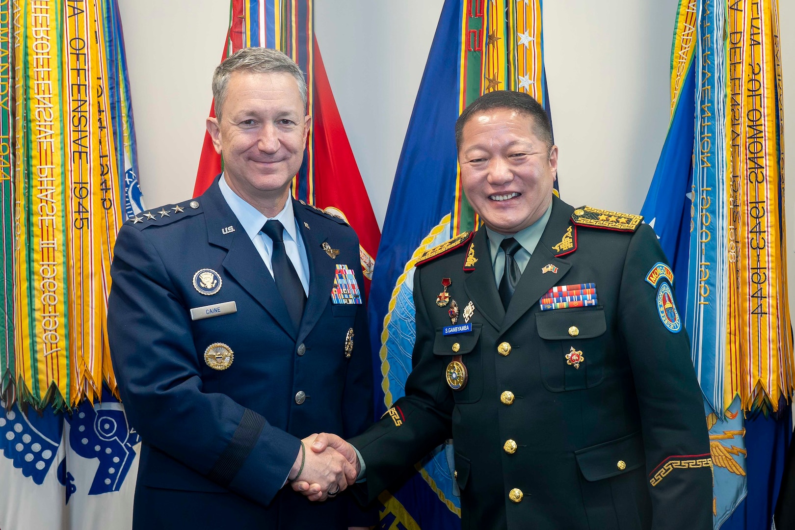Chairman of the Joint Chiefs of Staff Gen. Dan Caine meets with the Chief of the General Staff of the Mongolian Armed Forces Lt. Gen. Ganbyamba Sunrev at the Pentagon, Washington D.C., Nov. 12, 2025. (DOW Photo by Chief Mass Communication Specialist James Mullen)