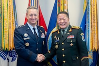 Chairman of the Joint Chiefs of Staff Gen. Dan Caine meets with the Chief of the General Staff of the Mongolian Armed Forces Lt. Gen. Ganbyamba Sunrev at the Pentagon, Washington D.C., Nov. 12, 2025. (DOW Photo by Chief Mass Communication Specialist James Mullen)