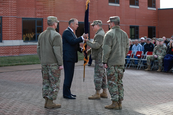 men in group pass flag