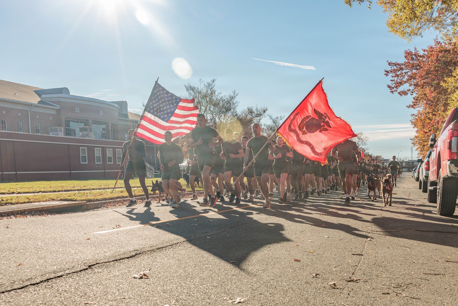 U.S. Marines run in formation to celebrate the 250th Marine Corps Birthday on MCB Quantico, Nov. 6, 2025. Marines from across the installation participated in a motivational run emphasizing esprit de corps and physical readiness showcasing unity and pride in their shared heritage. (U.S. Marine Corps photo by Lance Cpl. Jeffery Stevens)