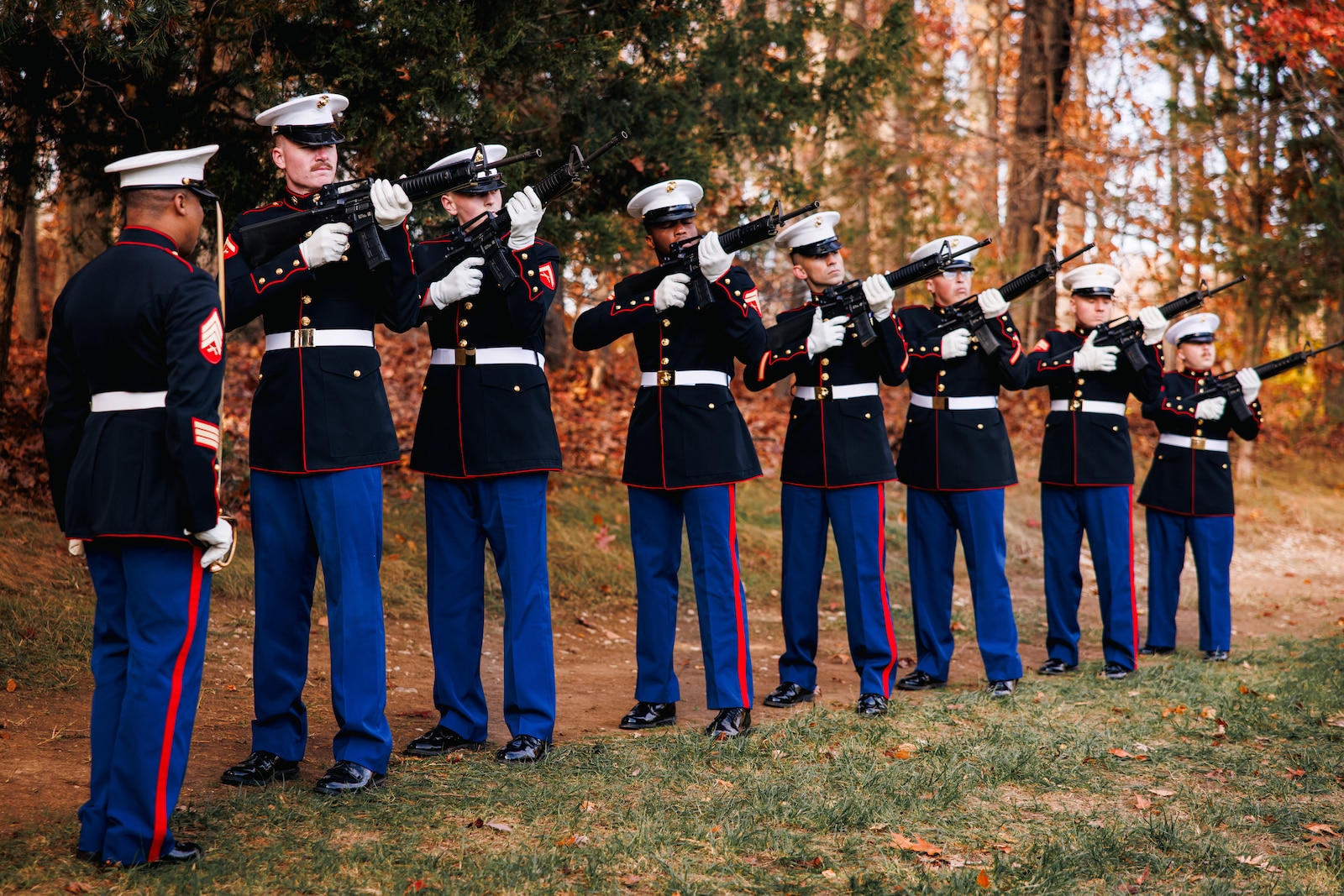 The Marine Corps Base Quantico Ceremonial Platoon conduct the 21-gun salute during the wreath laying ceremony of Sgt. Maj. Henry Black at the Quantico National Cemetery, Triangle, Virginia, November 10, 2025. This wreath laying ceremony honored Sgt. Maj. Henry Black, the seventh Sergeant Major of the Marine Corps, who served in active duty from 1948 to 1977, fighting in the Korean War, Vietnam War, and training recruits as a drill instructor at Marine Corps Recruit Depot Parris Island. (U.S. Marine Corps photo by Cpl. Braydon Rogers)
