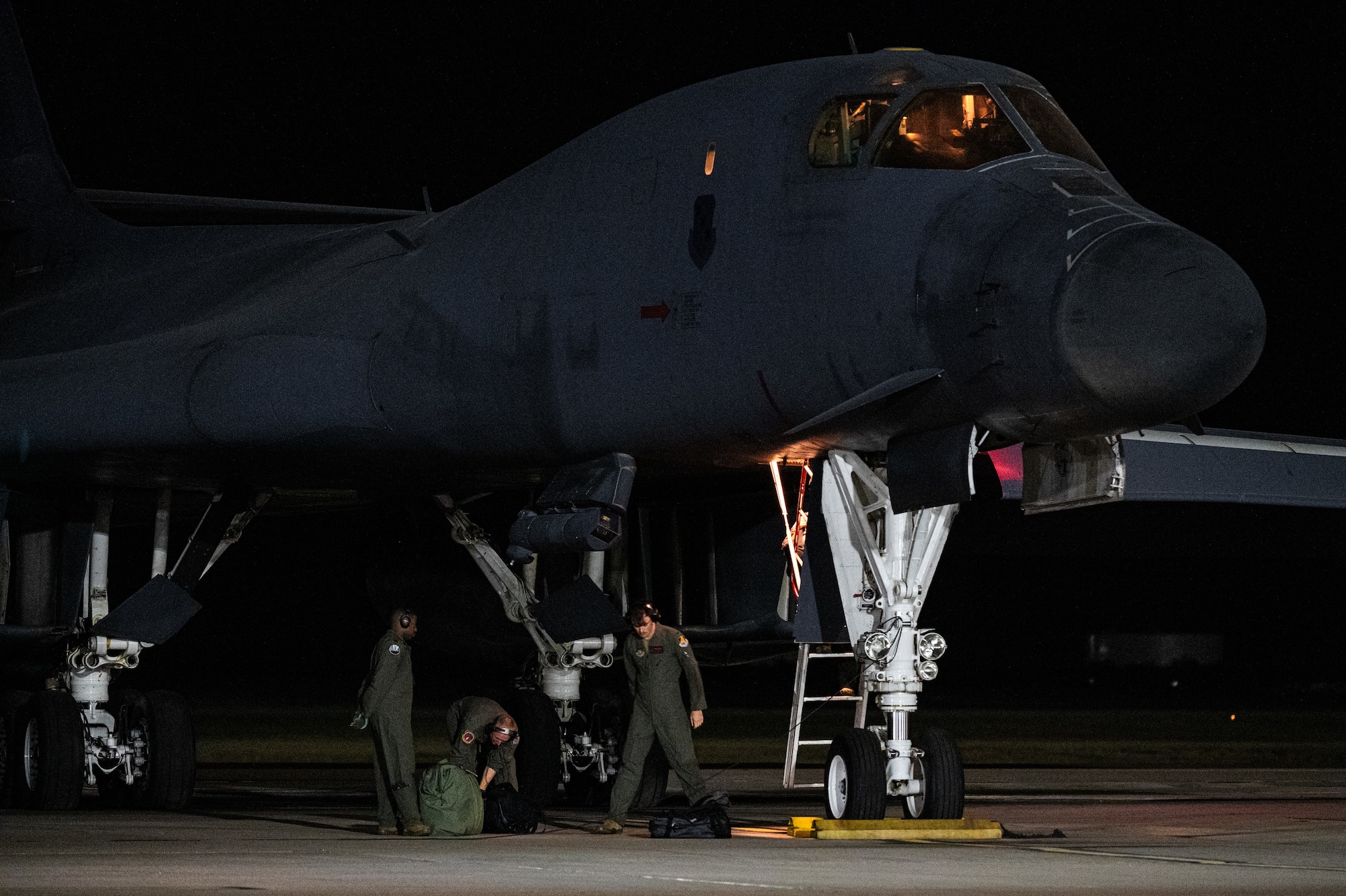 U.S. Airmen assigned to the 9th Bomb Squadron perform preflight inspections on a B-1B Lancer in support of a Bomber Task Force deployment at Dyess Air Force Base, Texas, Oct. 16, 2025. The 7th Bomb Wing, always ready to respond, is a powerful example of how the U.S. military deters threats and enhances security for the U.S. and our allies around the world. (U.S. Air Force photo by Senior Airman Jade M. Caldwell)